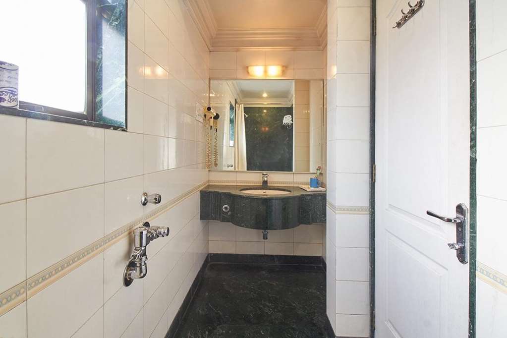 Hotel Srimaan Пюн Стая снимка