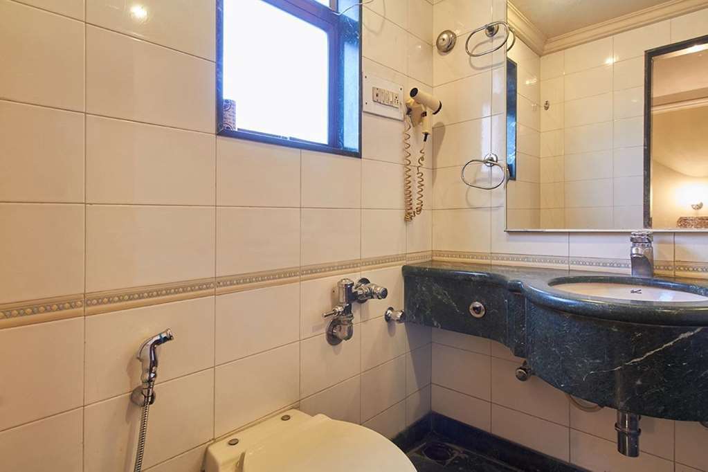 Hotel Srimaan Пюн Стая снимка